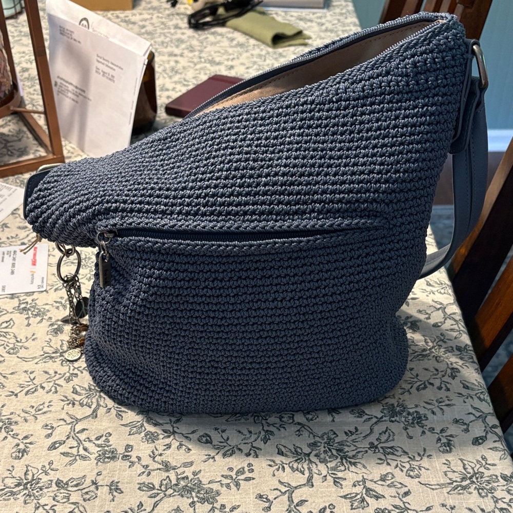 The Sak Tan 12x11 blue sequoia crochet bag